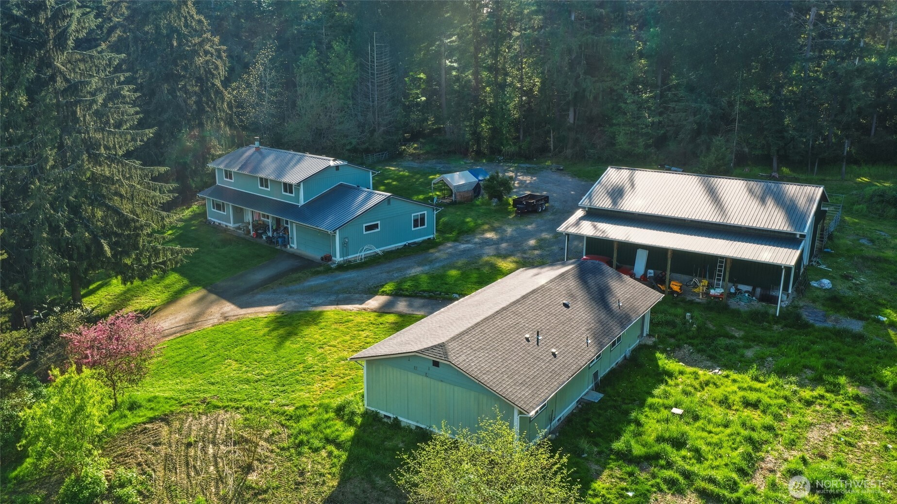 37214 Allen Road South Roy, WA 98580 - Photo 37 of 38 an aerial view of a house with garden space and street view