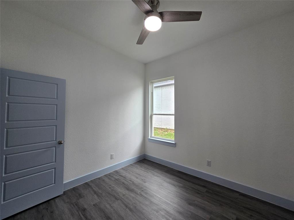 3202 Noor Street Dallas, TX 75233 - Photo 14 of 20 an empty room with a empty space and a window