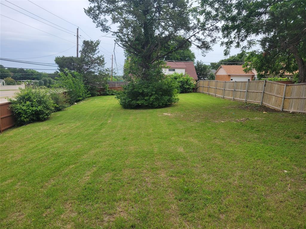 3202 Noor Street Dallas, TX 75233 - Photo 18 of 20 a view of a backyard