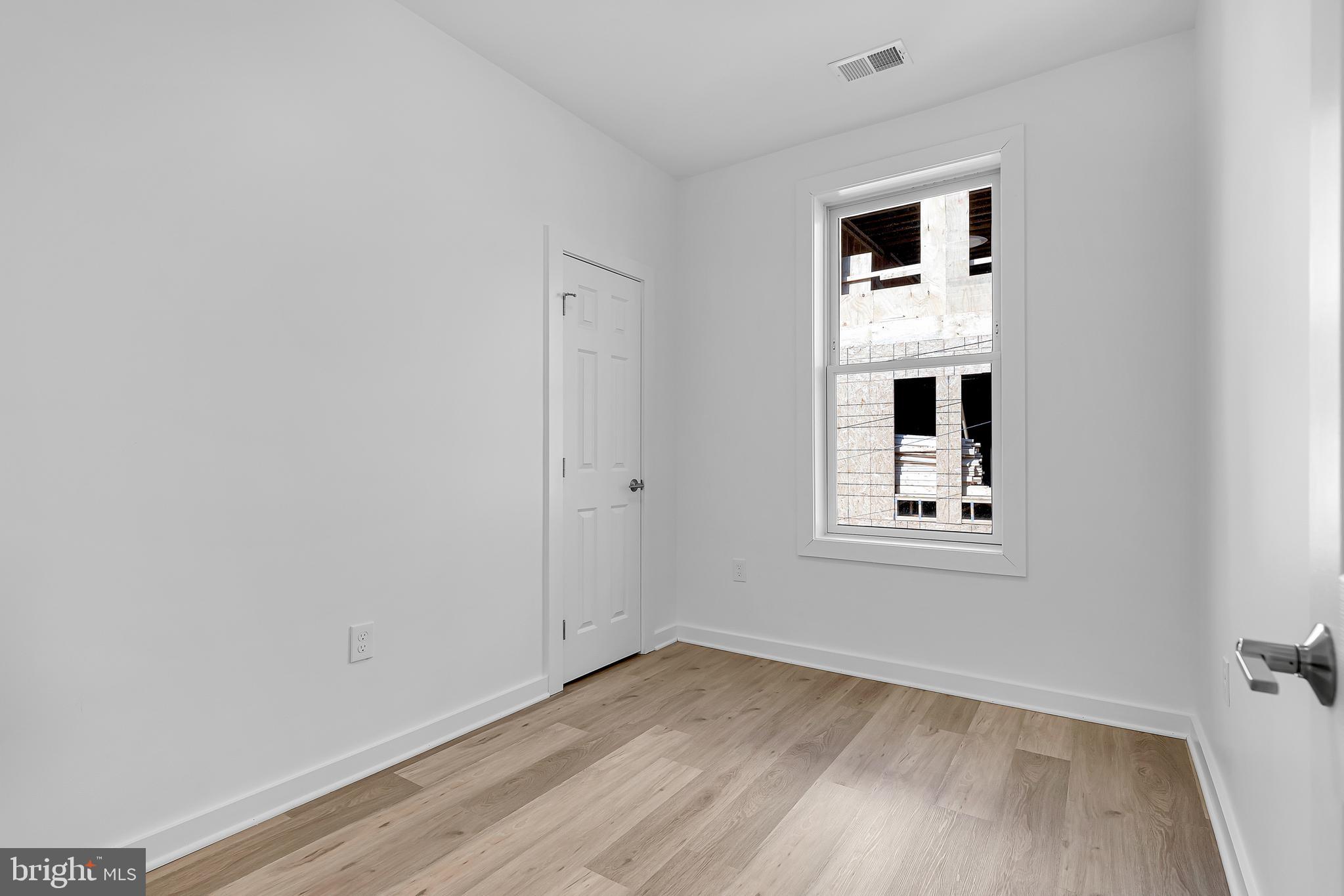 1712 3rd Street Northwest Washington, DC 20001 - Photo 24 of 32 a view of kitchen with wooden floor and window