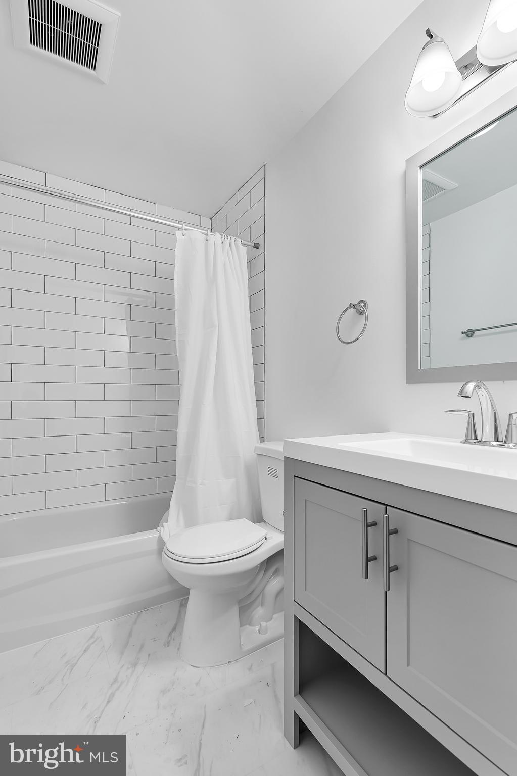 1712 3rd Street Northwest Washington, DC 20001 - Photo 9 of 32 a bathroom with a sink toilet and shower