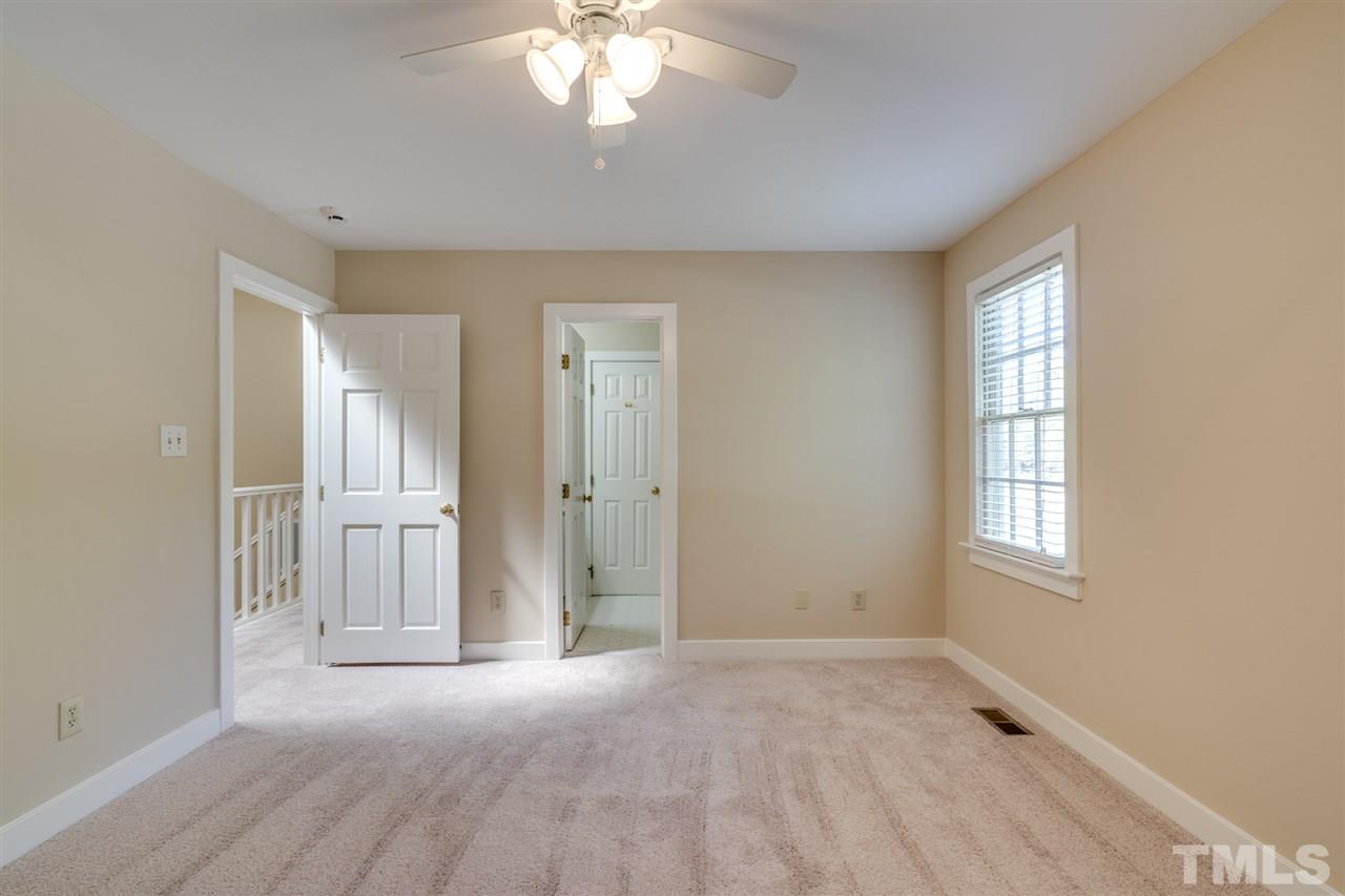 1401 Quarter Point Raleigh, NC 27615 - Photo 22 of 25 an empty room with windows and closet