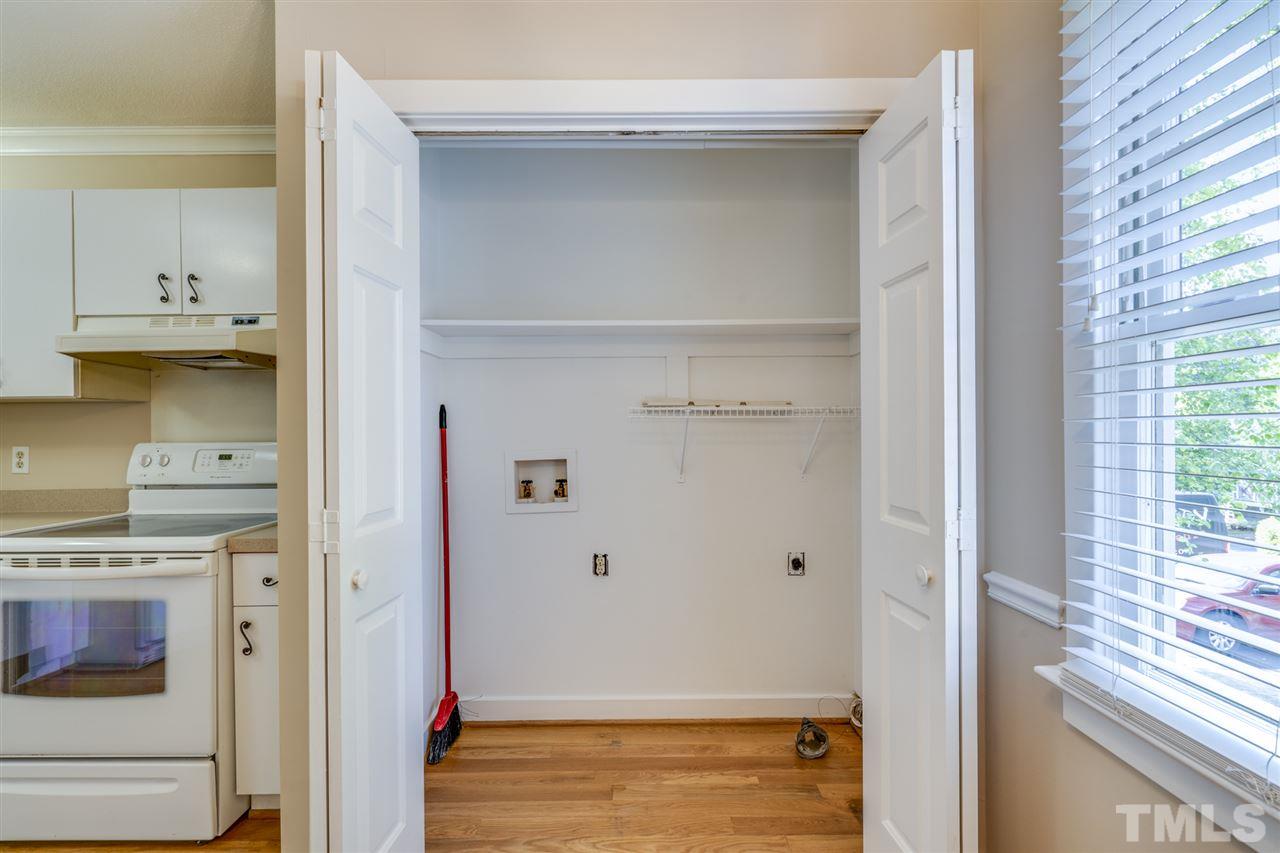 1401 Quarter Point Raleigh, NC 27615 - Photo 8 of 25 a view of kitchen and utility room