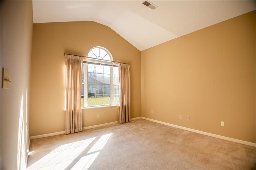 23 Stone Ridge Boulevard Hermitage, PA 16148 - Photo 13 of 23 a view of an empty room with a fireplace and a window