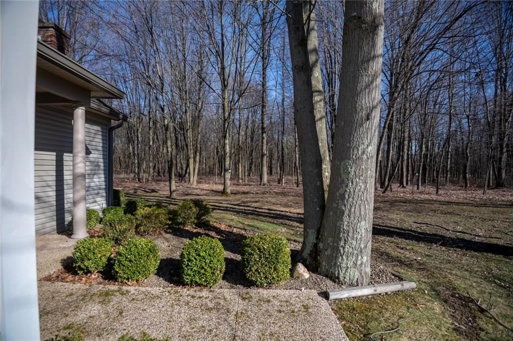 23 Stone Ridge Boulevard Hermitage, PA 16148 - Photo 2 of 23 a view of a yard with plants and trees