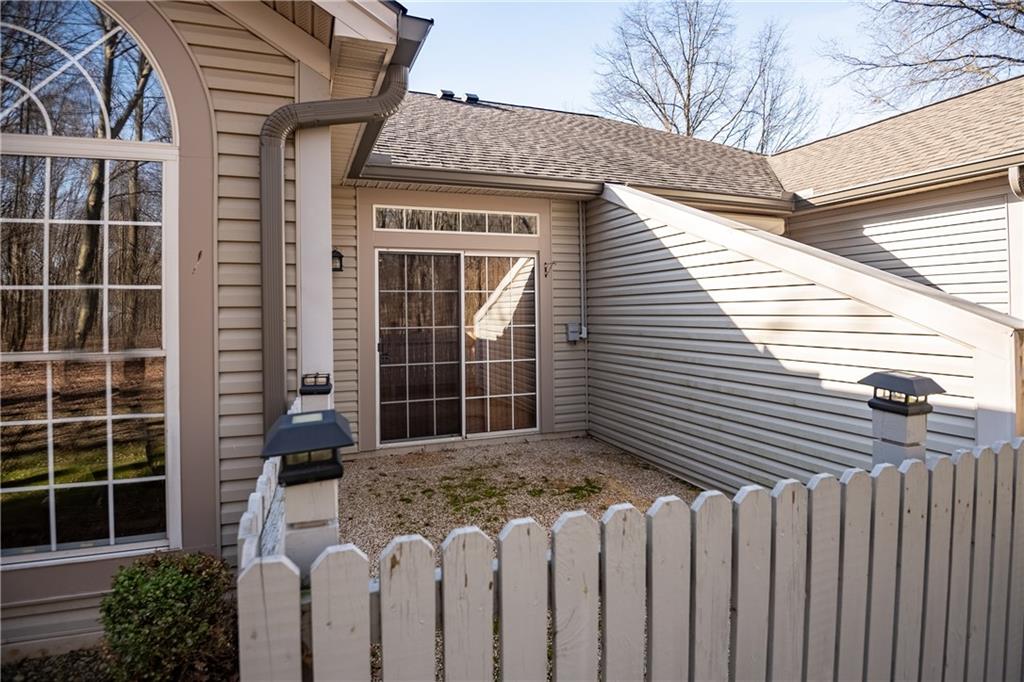 23 Stone Ridge Boulevard Hermitage, PA 16148 - Photo 21 of 23 a view of a house with a window and wooden fence