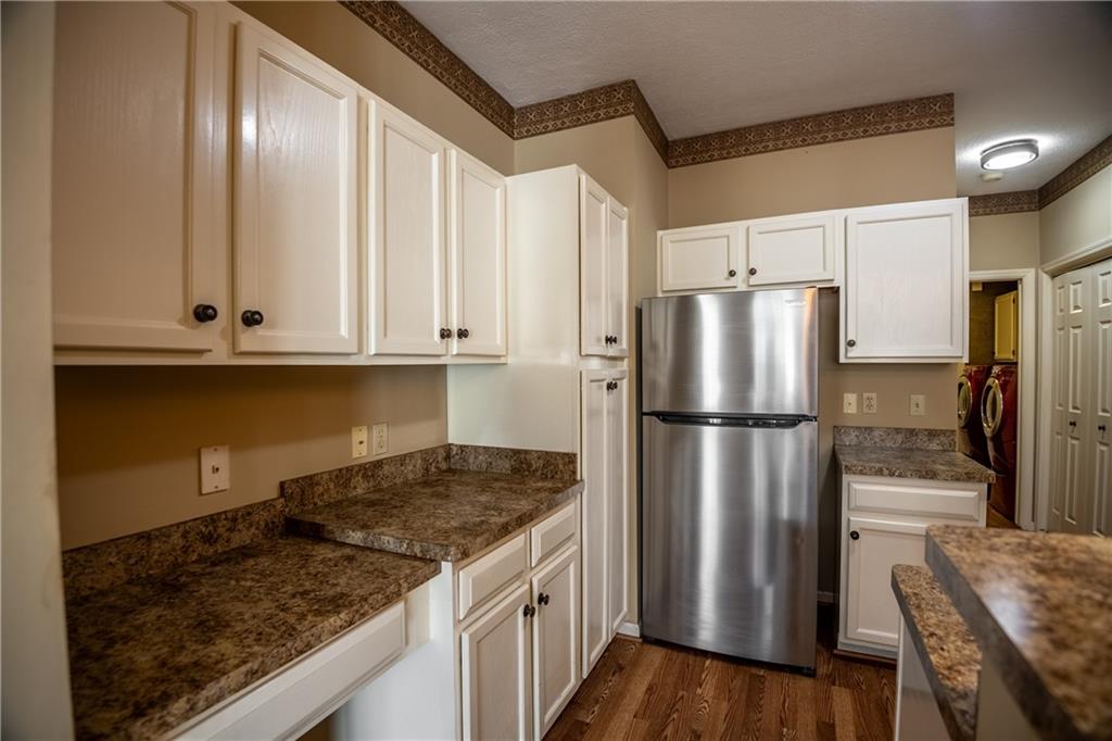 23 Stone Ridge Boulevard Hermitage, PA 16148 - Photo 8 of 23 a kitchen with a stove a refrigerator and a sink