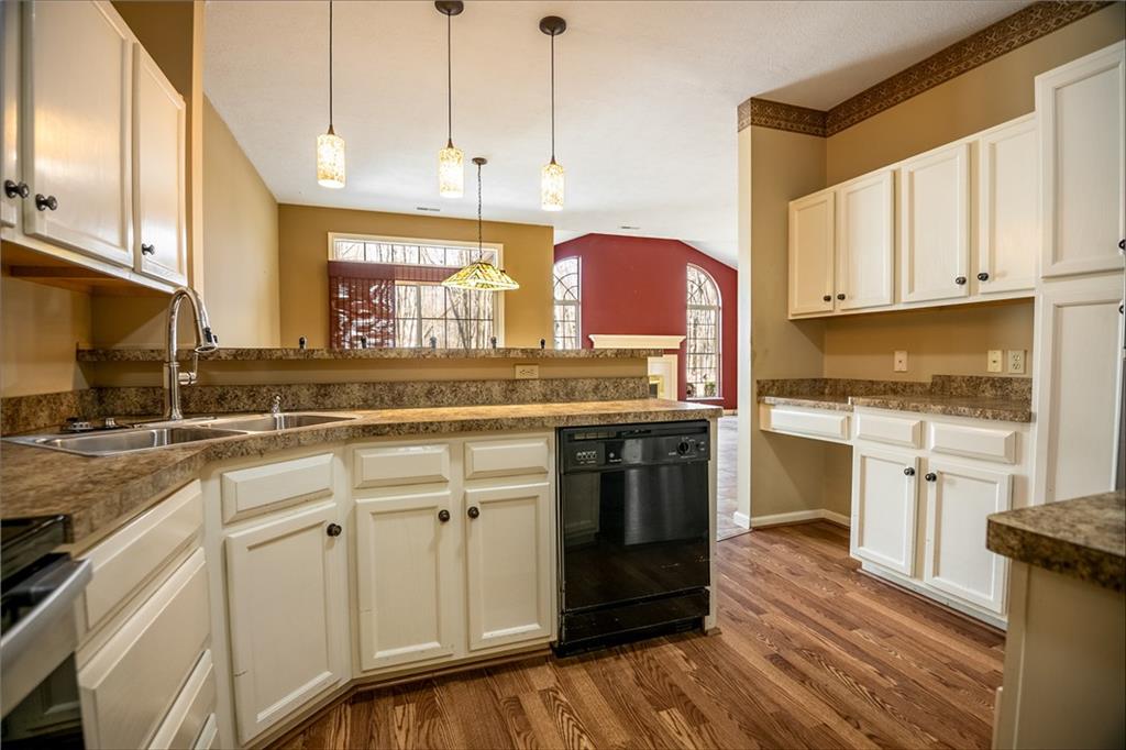 23 Stone Ridge Boulevard Hermitage, PA 16148 - Photo 10 of 23 a kitchen with granite countertop a sink cabinets stainless steel appliances and a counter space