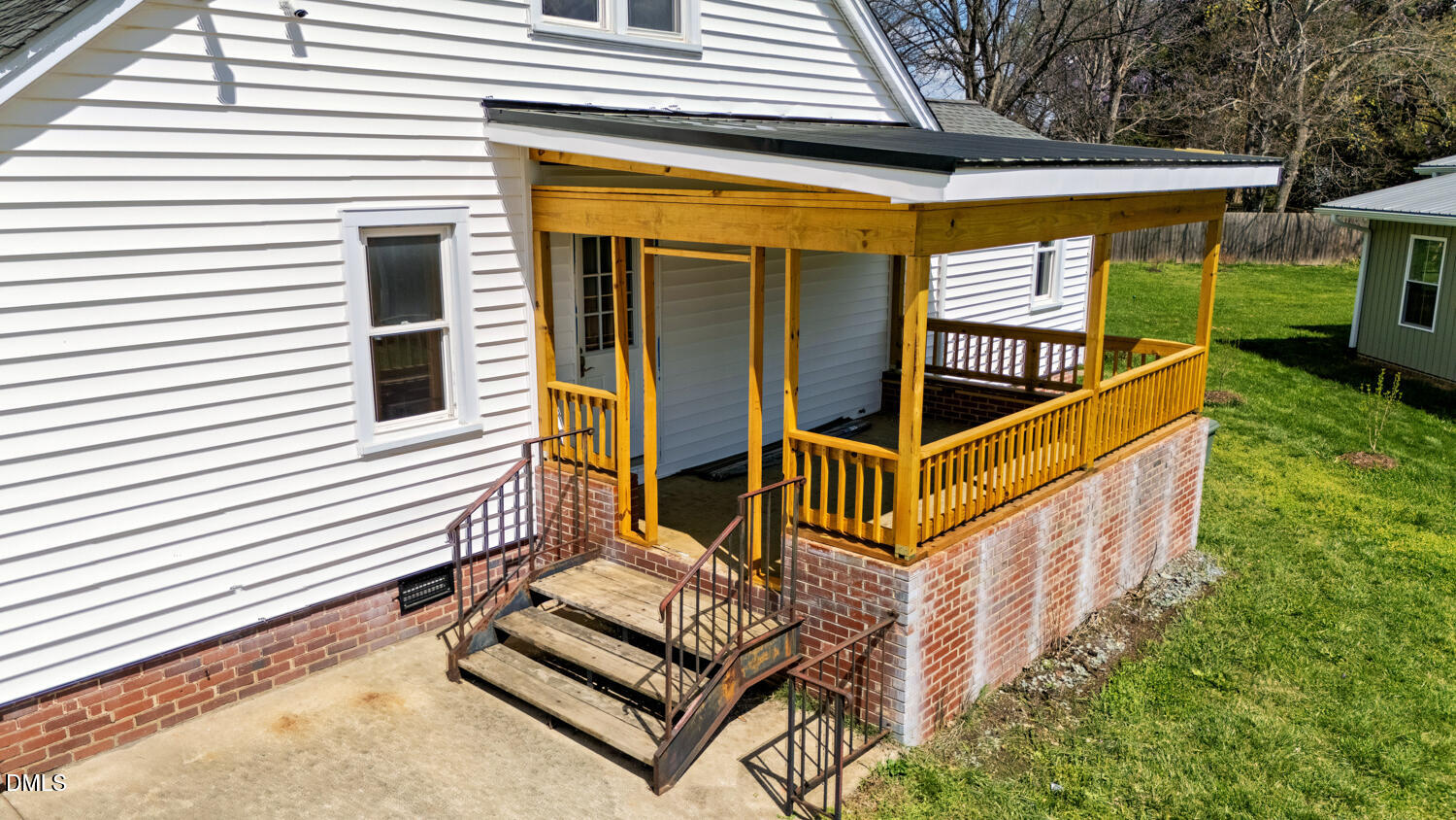 414 South Maple Street Graham, NC 27253 - Photo 33 of 42 a view of house with backyard and deck