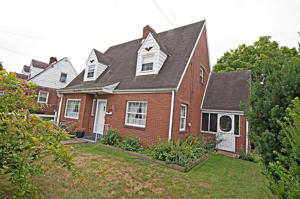 2854 Leechburg Road Lower Burrell, PA 15068 - Photo 2 of 25 Side view from the street. The door on the right leads to the screened porch.