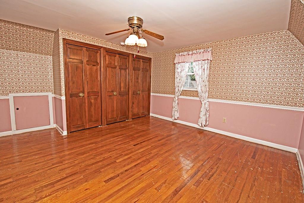 2854 Leechburg Road Lower Burrell, PA 15068 - Photo 19 of 25 The master bedroom with exposed hardwood flooring and spacious double closets.
