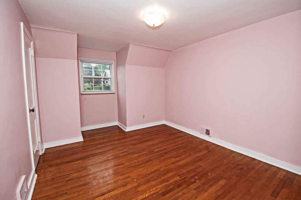 2854 Leechburg Road Lower Burrell, PA 15068 - Photo 20 of 25 2nd bedroom with exposed hardwood flooring.