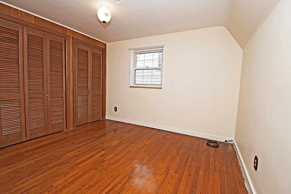 2854 Leechburg Road Lower Burrell, PA 15068 - Photo 22 of 25 The third bedroom with exposed hardwood flooring and double closet space.