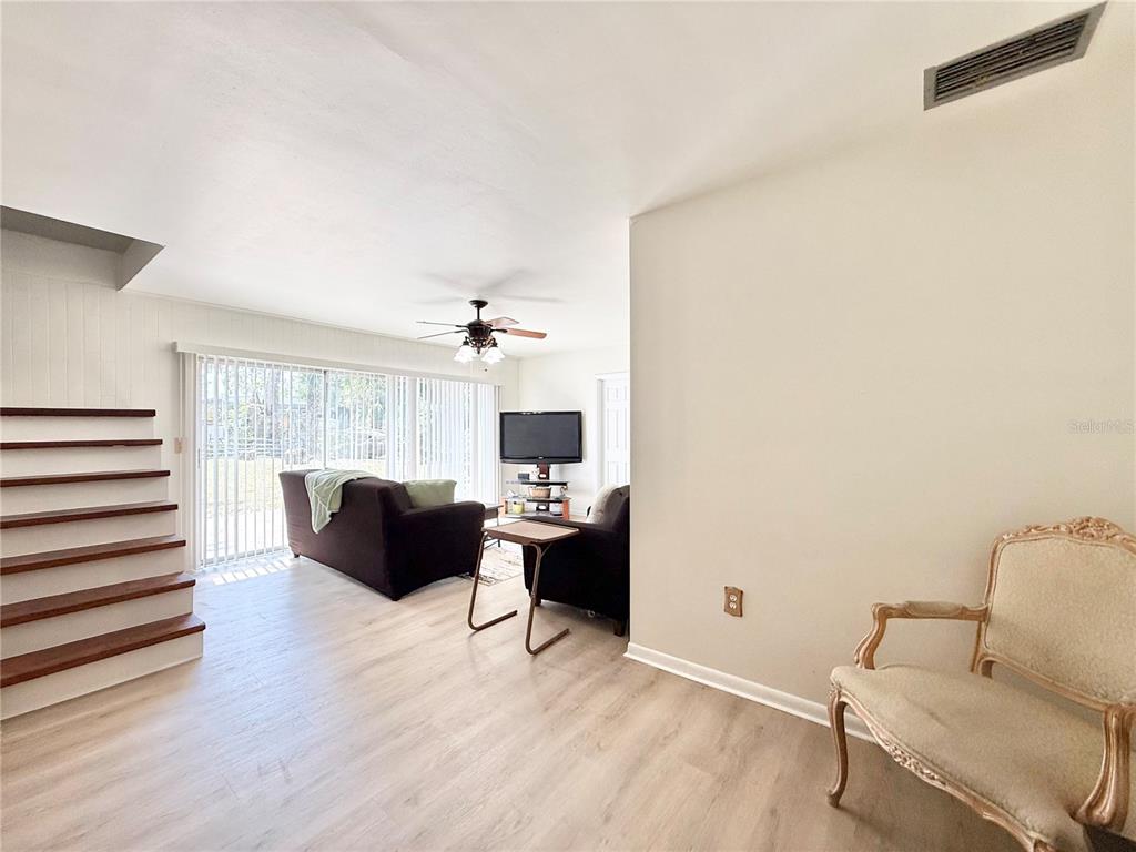 5846 Wyoming Avenue New Port Richey, FL 34652 - Photo 19 of 47 a living room with furniture and a large window