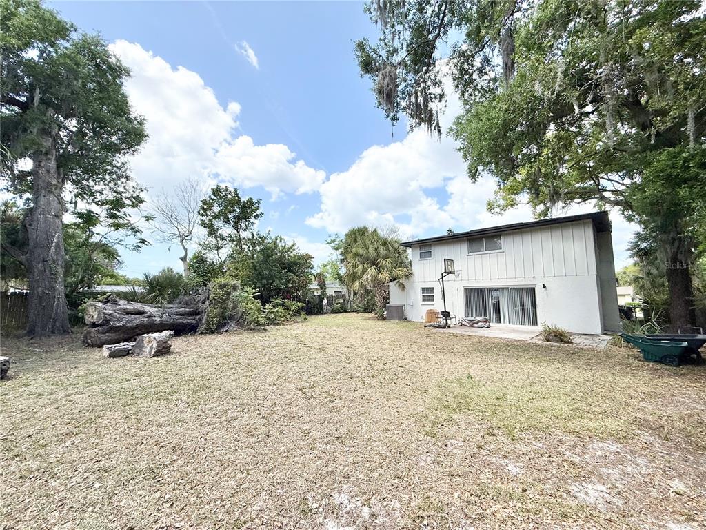 5846 Wyoming Avenue New Port Richey, FL 34652 - Photo 47 of 47 a view of a house with a yard covered in snow