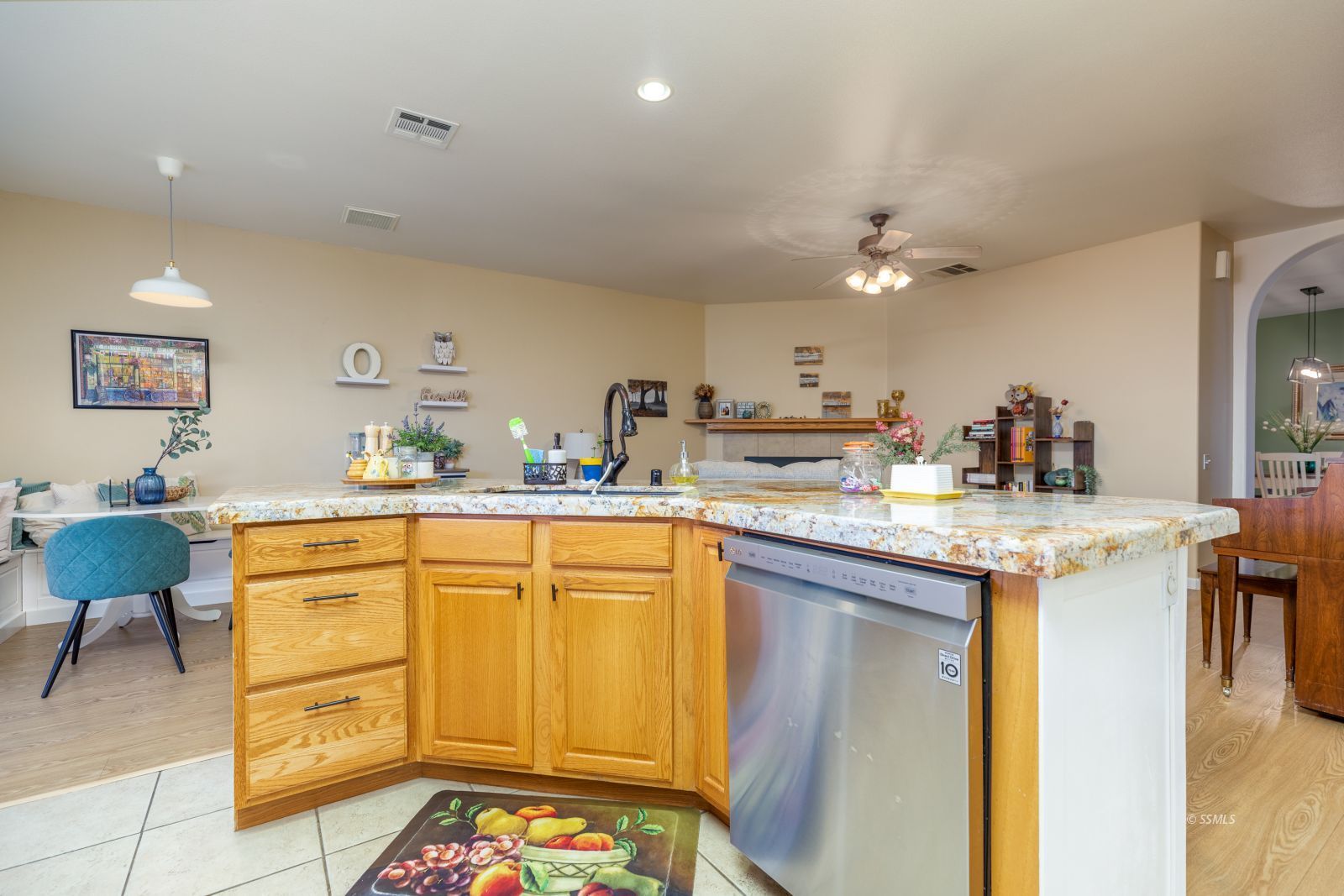 718 Pinon Court Ridgecrest, CA 93555 - Photo 14 of 41 a kitchen with stainless steel appliances granite countertop a sink and cabinets