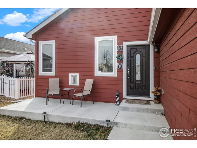 a view front of house with outdoor seating