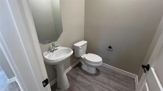 a bathroom with a sink and a toilet