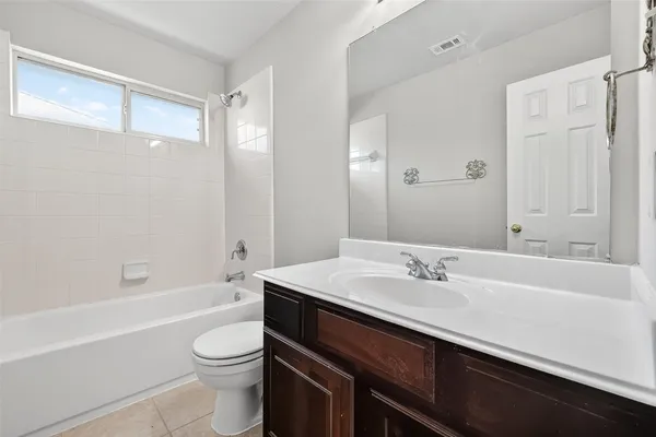 a view of room with wooden floor