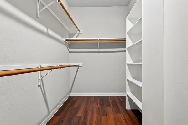 a white bath tub sitting next to a window