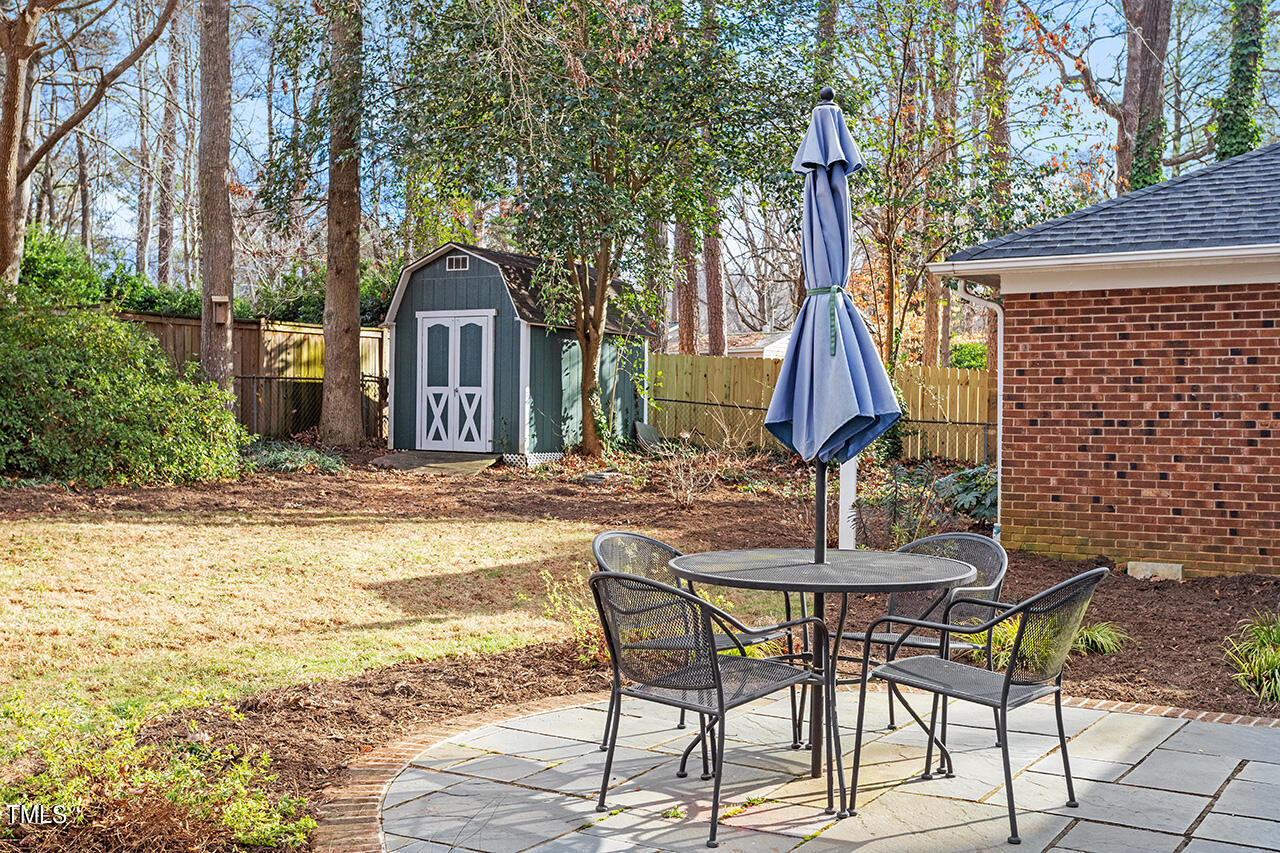 2010 Myron Drive Raleigh, NC 27607 - Photo 10 of 38 a view of a house with backyard and sitting area