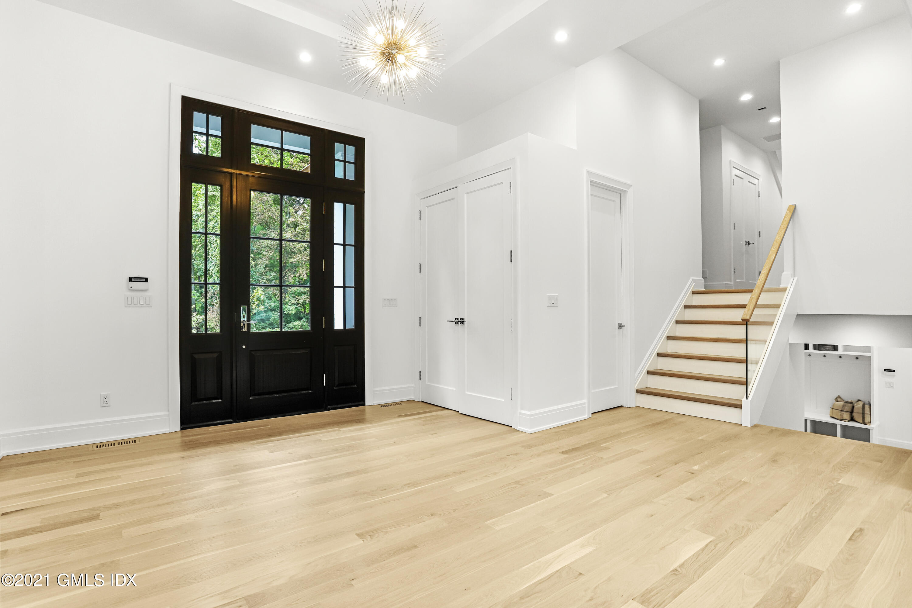 633 Round Hill Road Greenwich, CT 06831 - Photo 2 of 26 a view of entryway and hall with wooden floor