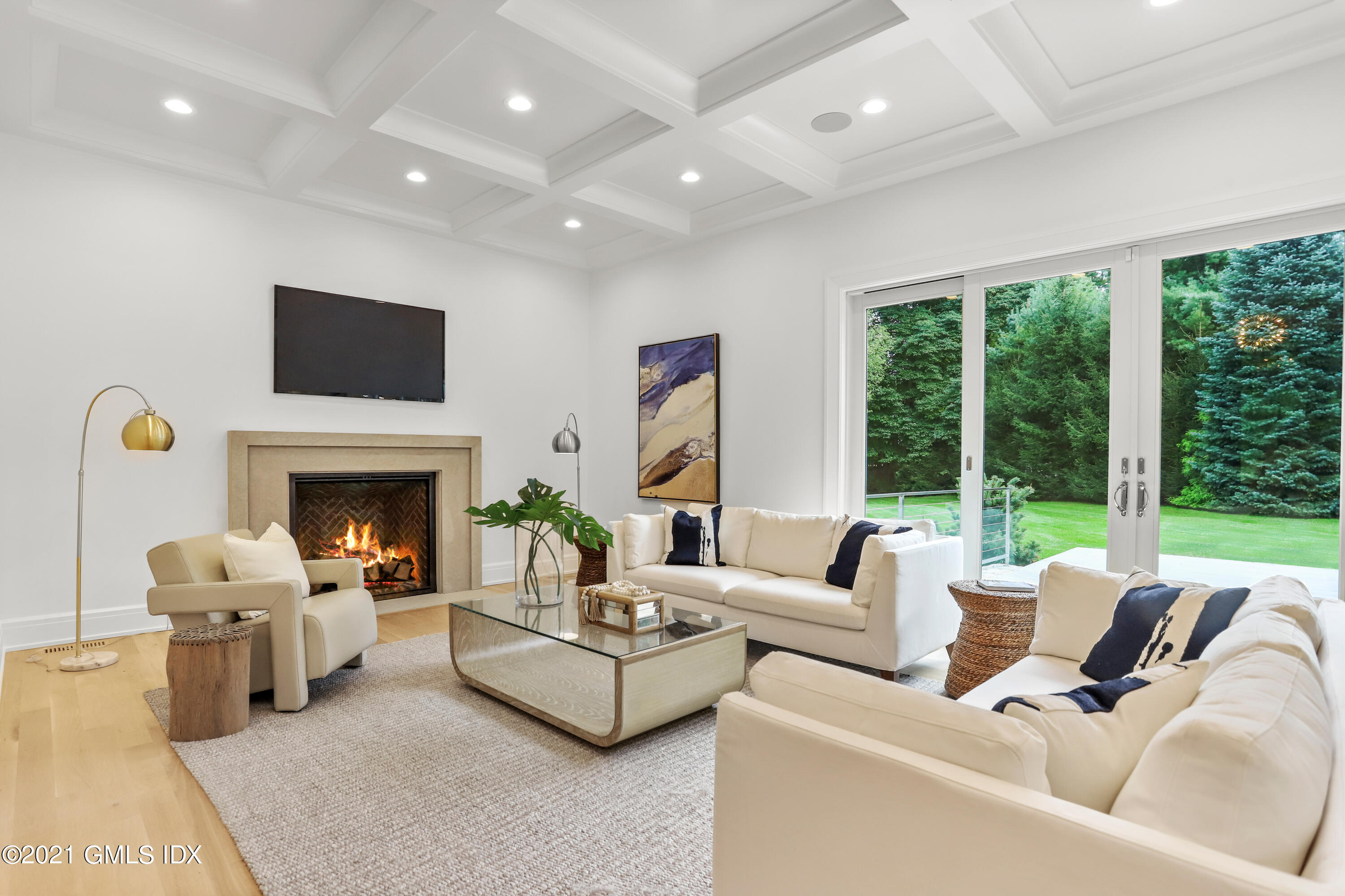 633 Round Hill Road Greenwich, CT 06831 - Photo 6 of 26 a living room with furniture large window and a fireplace
