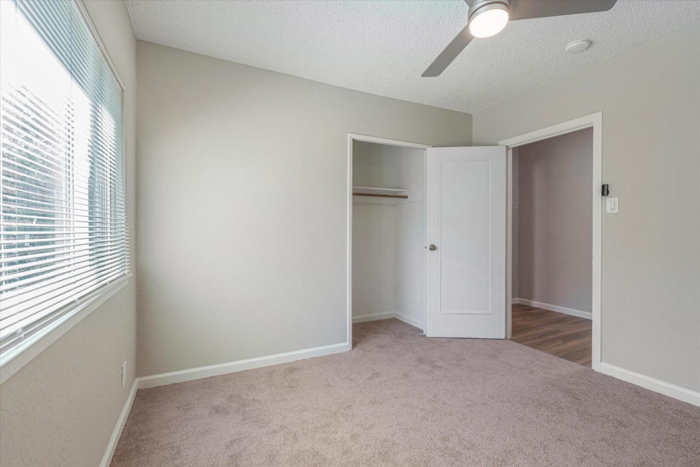 149 Covena Avenue Modesto, CA 95354 - Photo 15 of 24 an empty room with windows