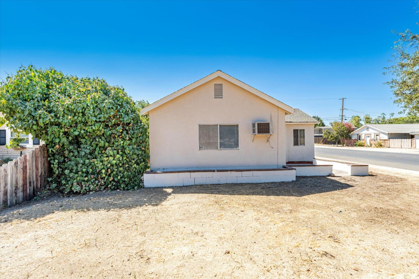 149 Covena Avenue Modesto, CA 95354 - Photo 20 of 24 a front view of a house with a yard