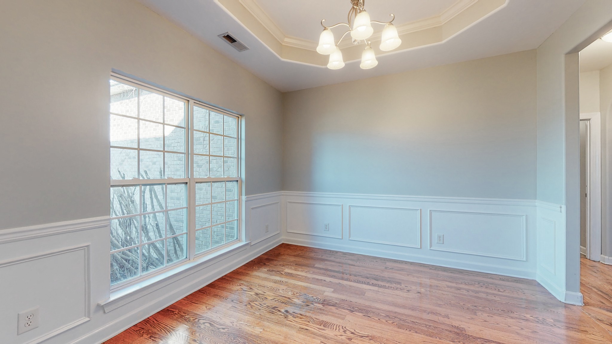 6023 Murfreesboro Road Lebanon, TN 37090 - Photo 17 of 42 a view of an empty room with wooden floor and a window