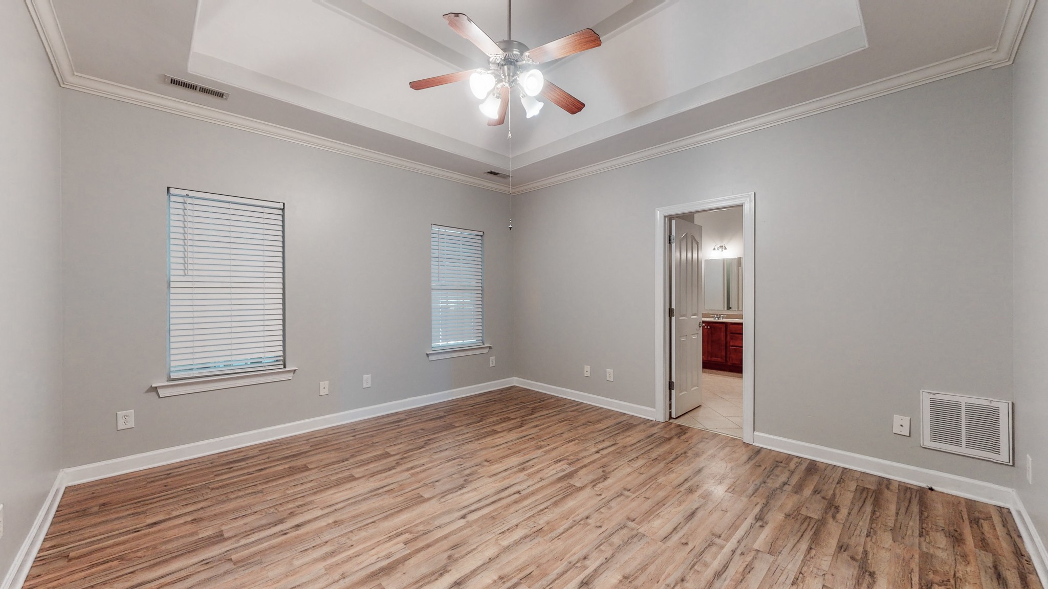 6023 Murfreesboro Road Lebanon, TN 37090 - Photo 18 of 42 wooden floor in an empty room with a window