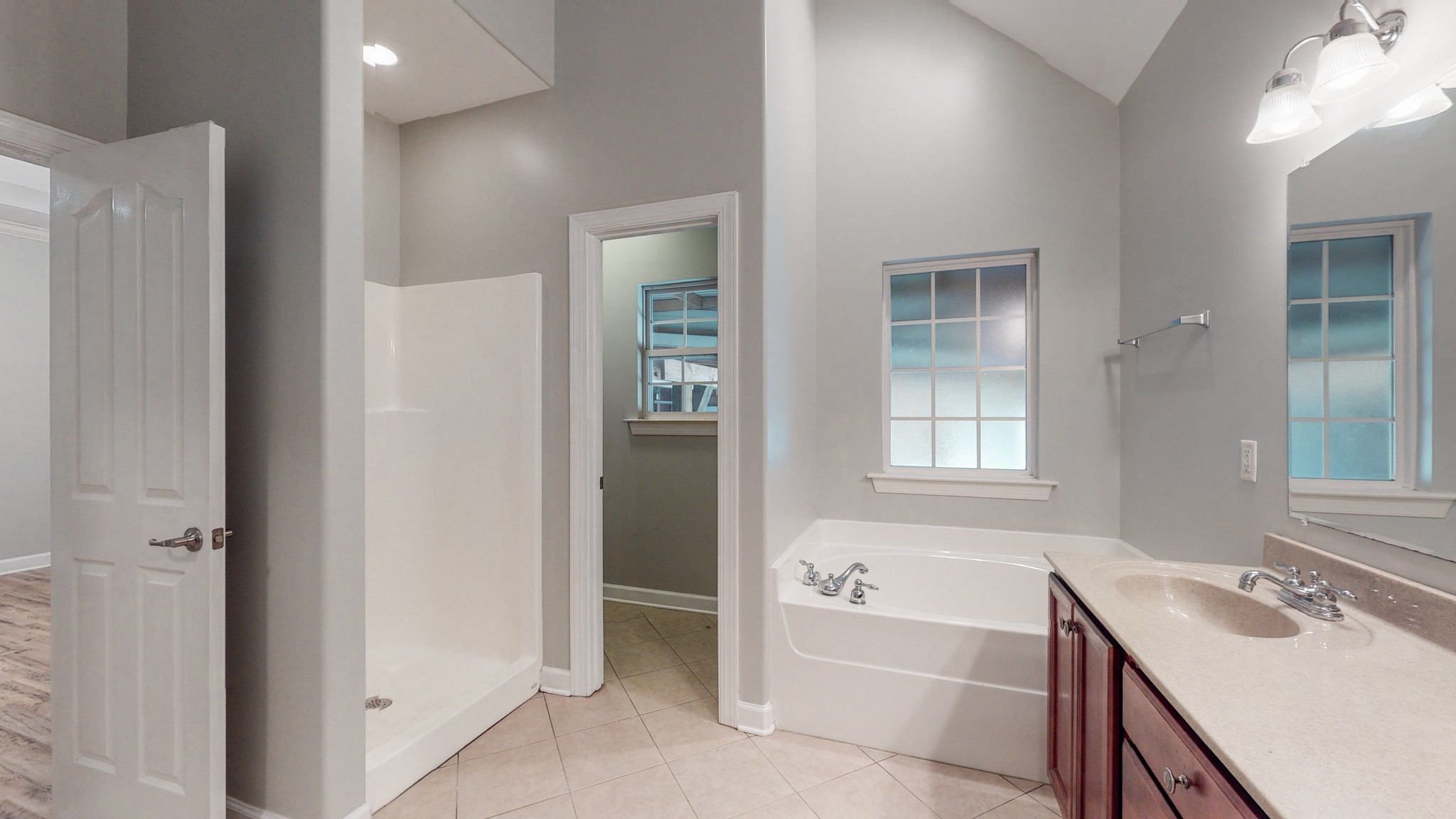 6023 Murfreesboro Road Lebanon, TN 37090 - Photo 21 of 42 a bathroom with a tub sink and mirror
