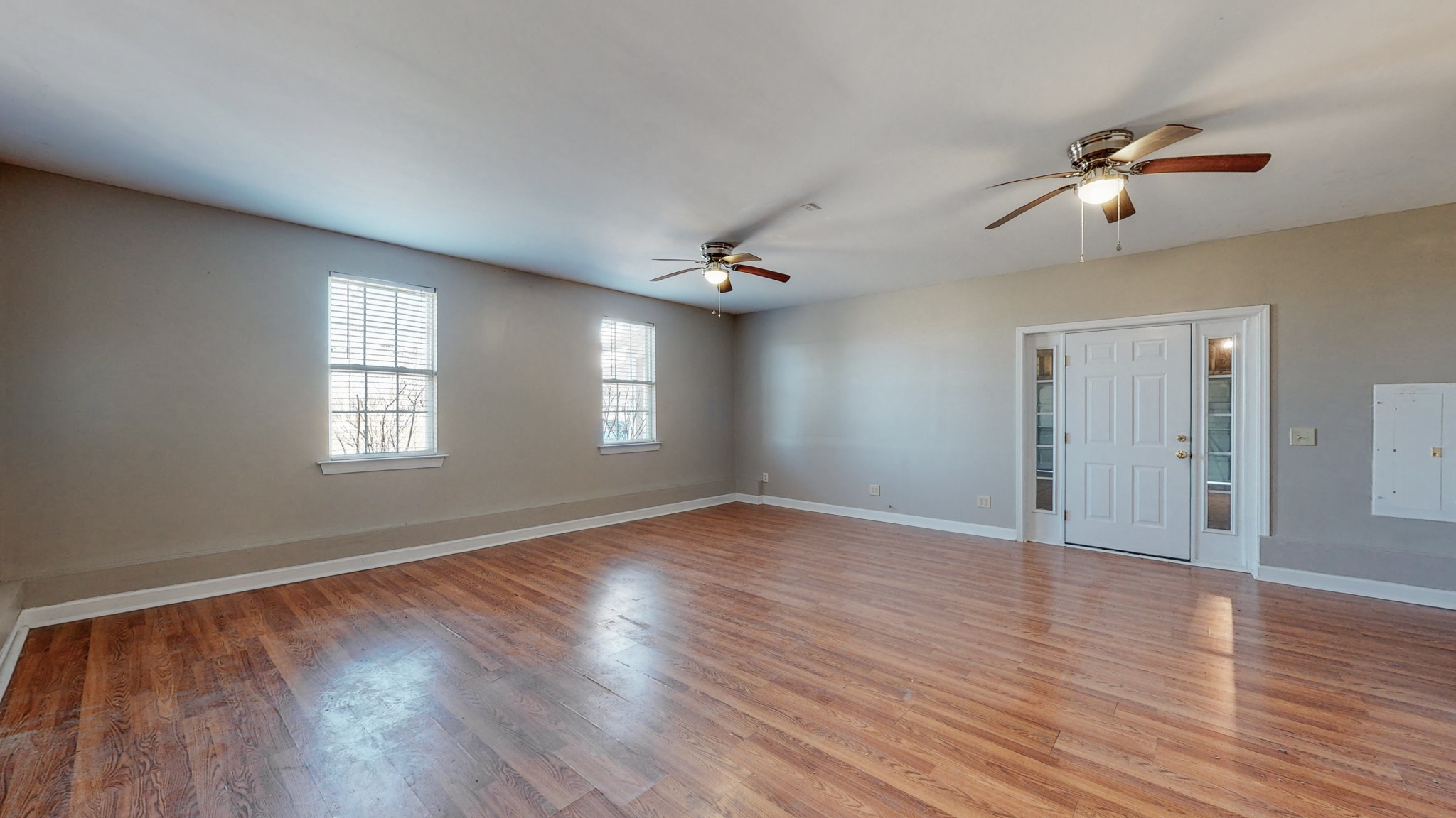 6023 Murfreesboro Road Lebanon, TN 37090 - Photo 23 of 42 a view of an empty room with wooden floor and a window