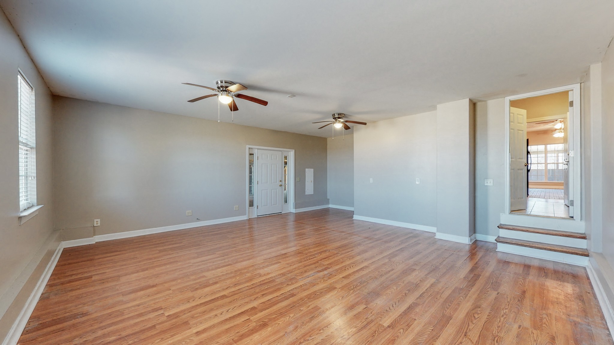 6023 Murfreesboro Road Lebanon, TN 37090 - Photo 24 of 42 a view of empty room with wooden floor and fan