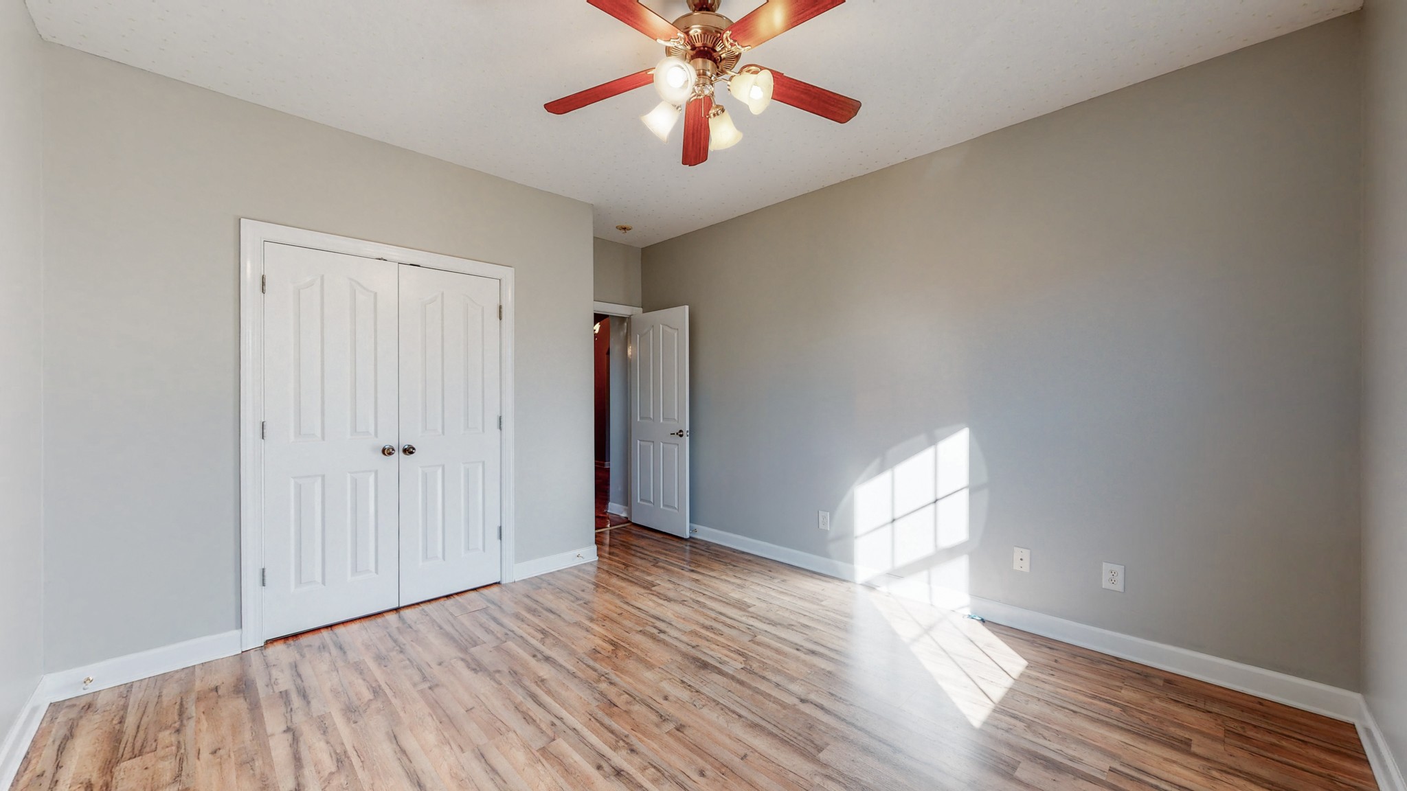 6023 Murfreesboro Road Lebanon, TN 37090 - Photo 26 of 42 a view of empty room with wooden floor and fan