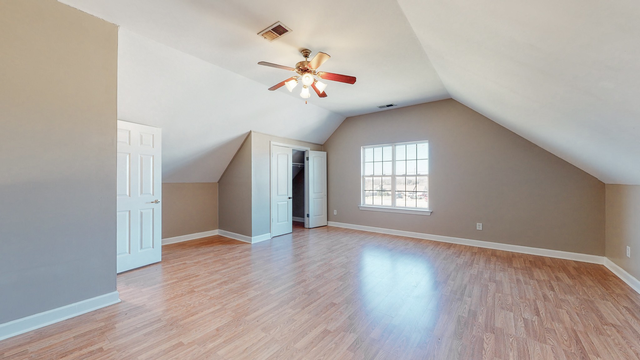 6023 Murfreesboro Road Lebanon, TN 37090 - Photo 30 of 42 a view of an empty room with wooden floor and a window