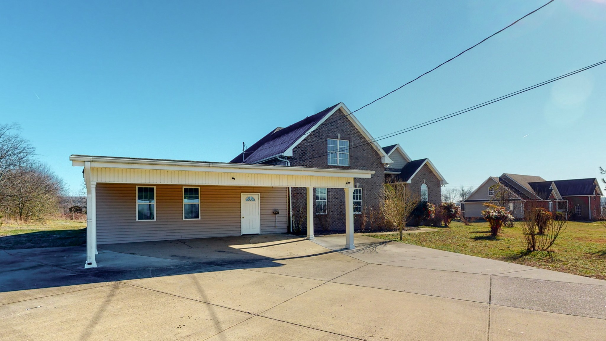 6023 Murfreesboro Road Lebanon, TN 37090 - Photo 34 of 42 a front view of a house with a yard