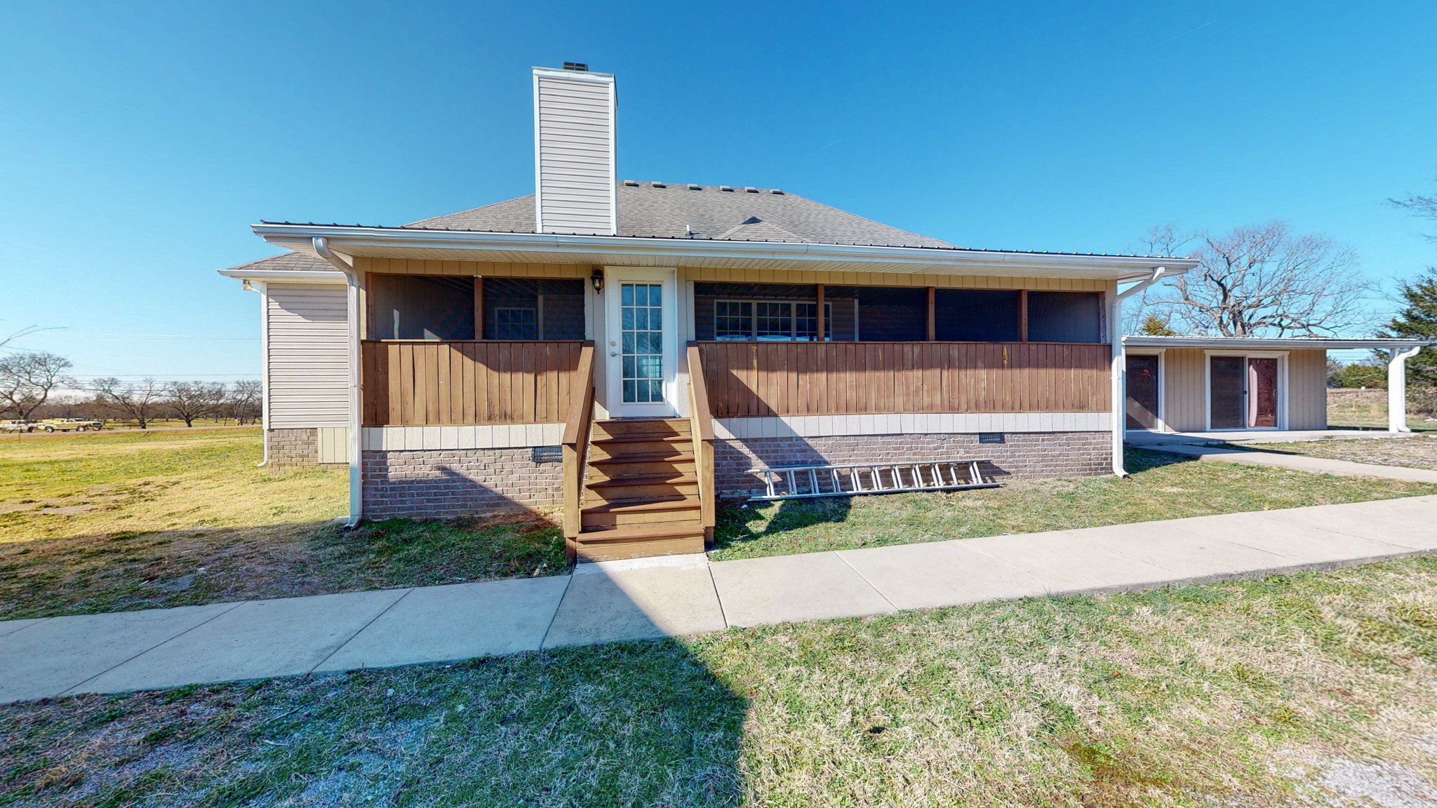 6023 Murfreesboro Road Lebanon, TN 37090 - Photo 36 of 42 a front view of a house with a yard
