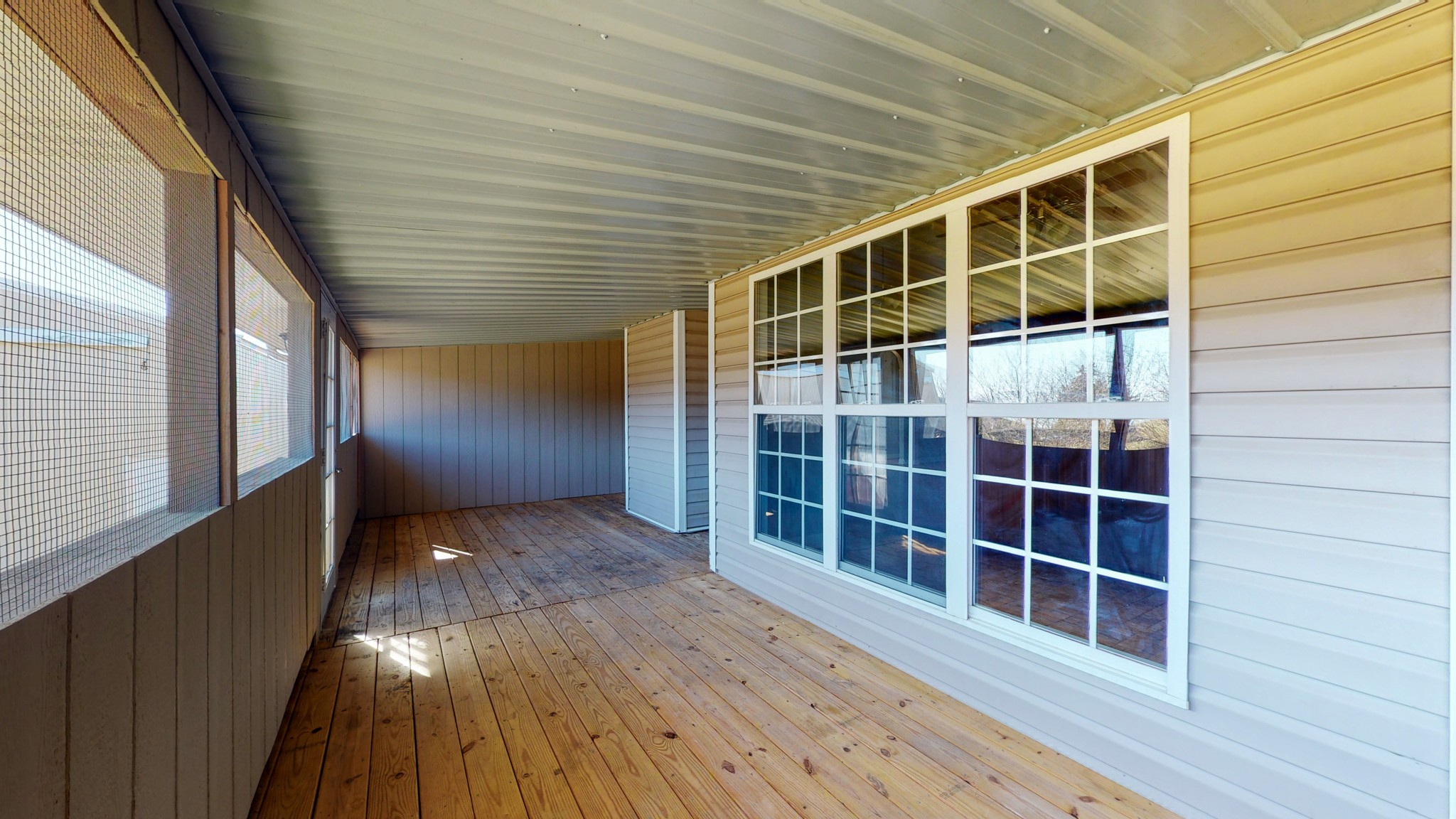 6023 Murfreesboro Road Lebanon, TN 37090 - Photo 39 of 42 a view of empty room with wooden floor and windows