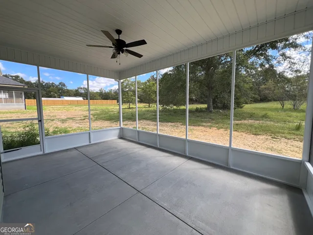 a view of a room with window in it