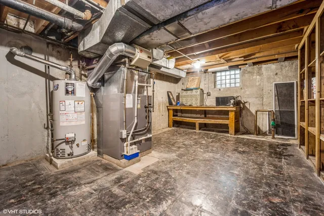 a view of a room with wooden walls