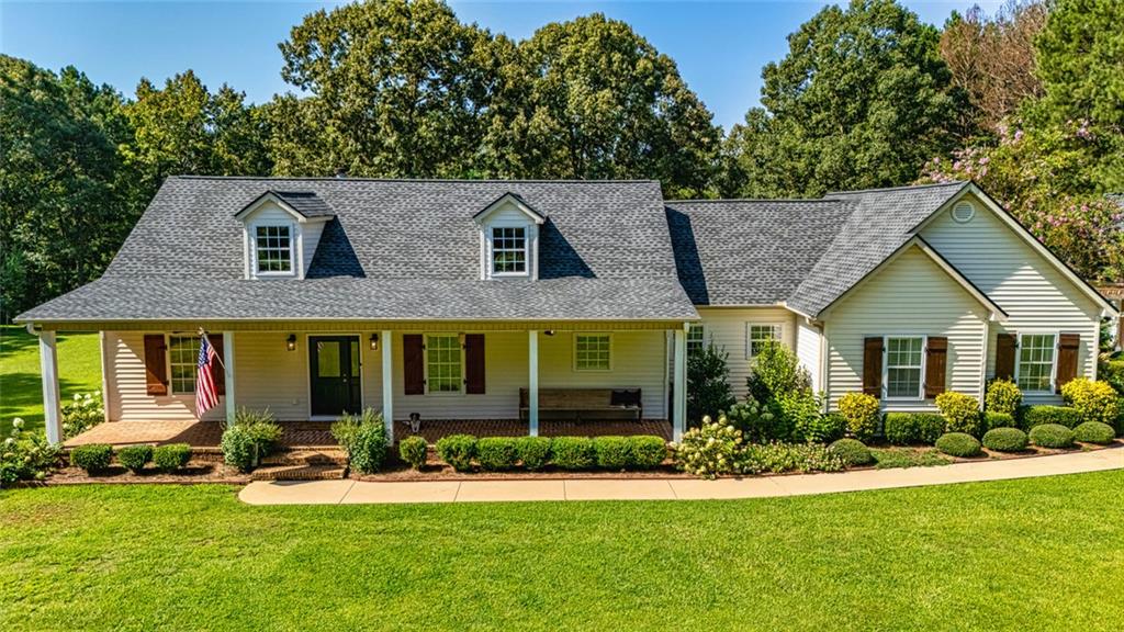 front view of a house with a yard