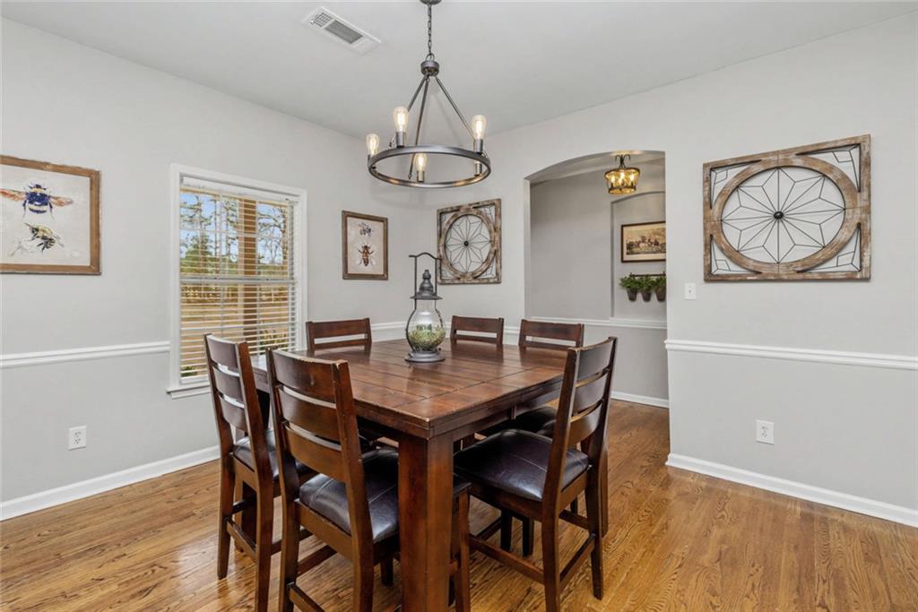 696 Highway 18 Barnesville, GA 30204 - Photo 15 of 57 a view of a dining room with furniture window and wooden floor