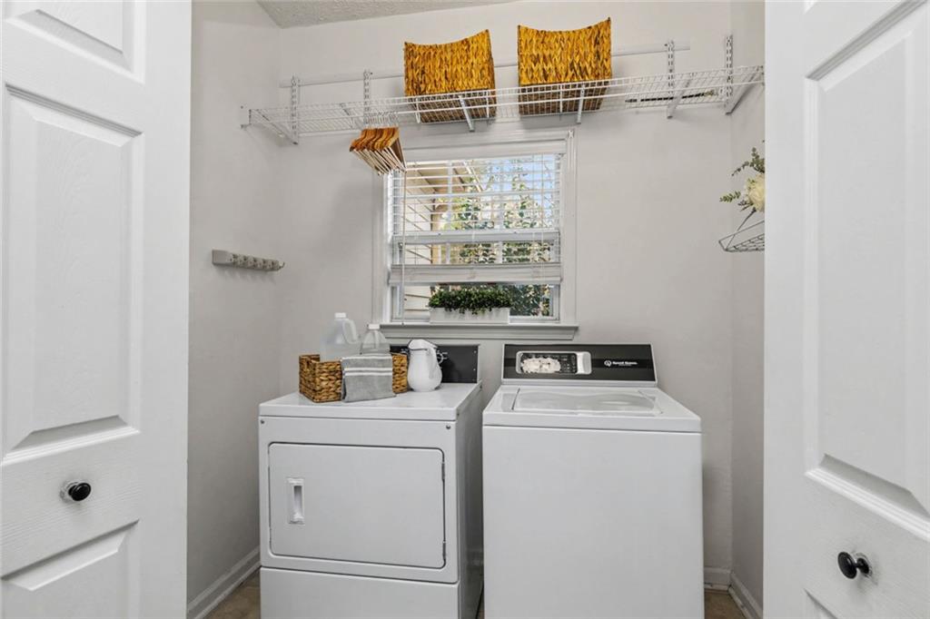696 Highway 18 Barnesville, GA 30204 - Photo 25 of 57 a utility room with dryer and washer