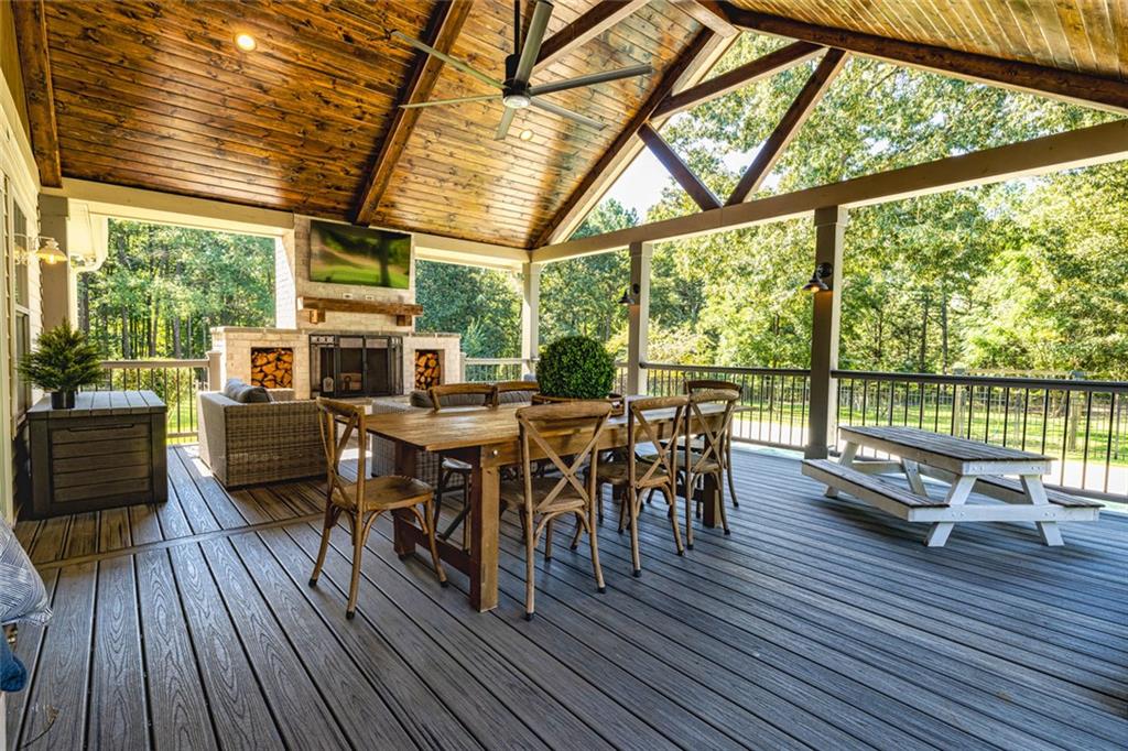 696 Highway 18 Barnesville, GA 30204 - Photo 3 of 57 a view of a patio with table and chairs