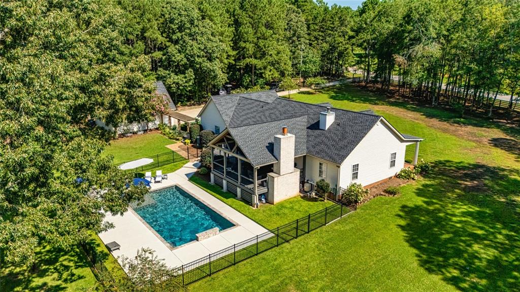 696 Highway 18 Barnesville, GA 30204 - Photo 57 of 57 an aerial view of a house
