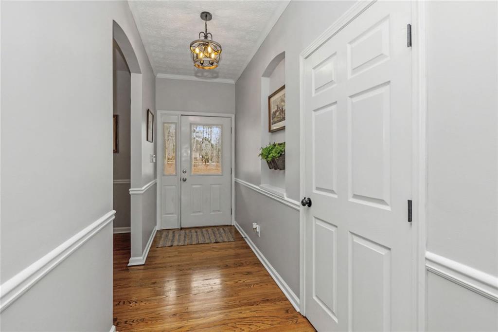 696 Highway 18 Barnesville, GA 30204 - Photo 6 of 57 a view of hallway with wooden floor