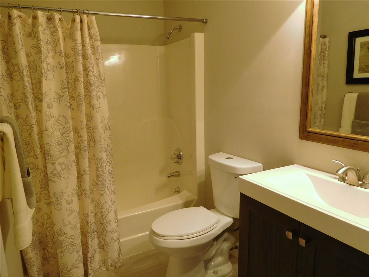 1770 Cooper Branch Road Clayton, NC 27520 - Photo 13 of 24 Guests will enjoy the new ceramic tile floor, vanity, new toilet and fixtures. Hall Bath
