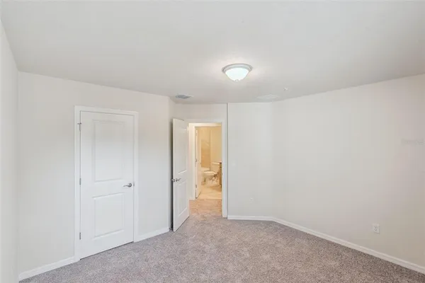 an empty room with a door