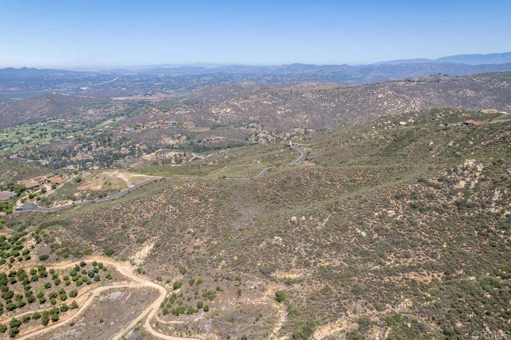 18055 Sunset Point Poway, CA 92064 - Photo 14 of 39 a view of a big yard with mountain and trees